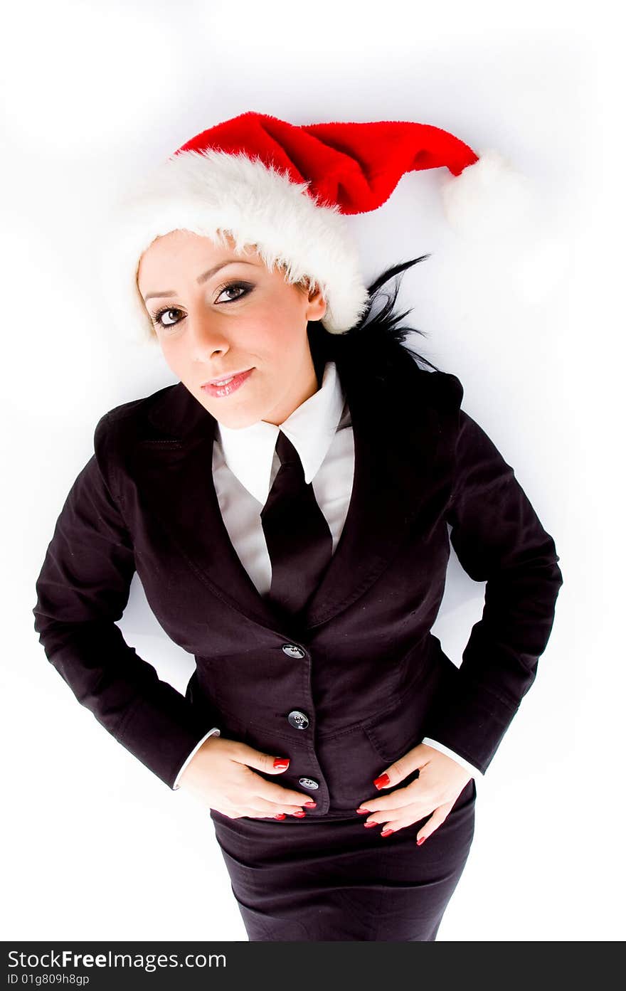 Young employee wearing christmas hat on an isolated white background