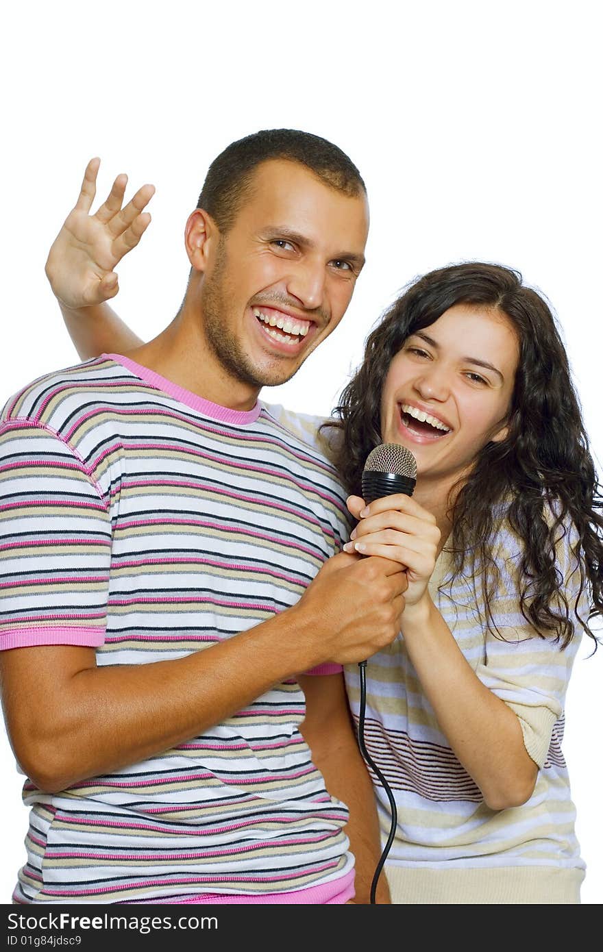 Young happy couple singing isolated on white background