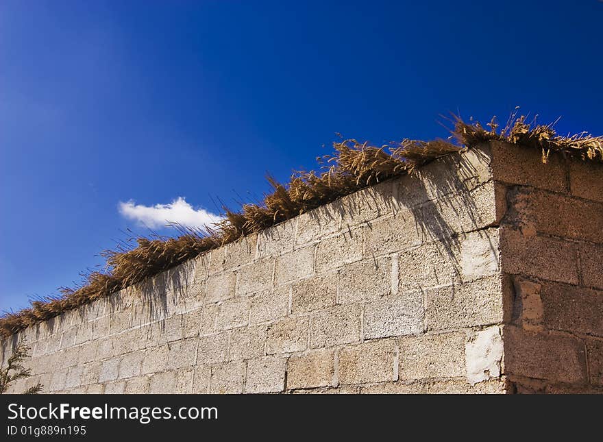 One noodles brick wall, the sky in blue