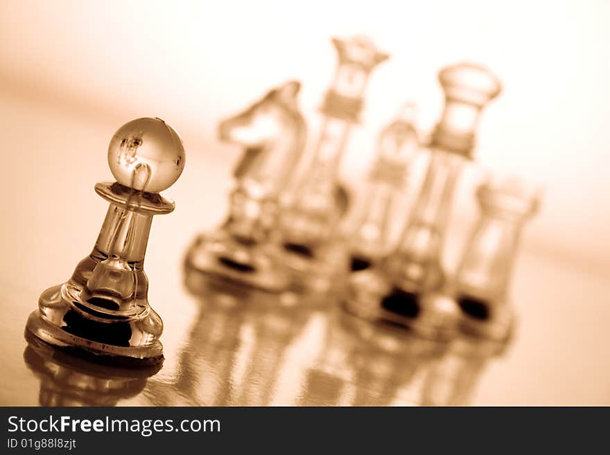 Transparent chess on a brown background