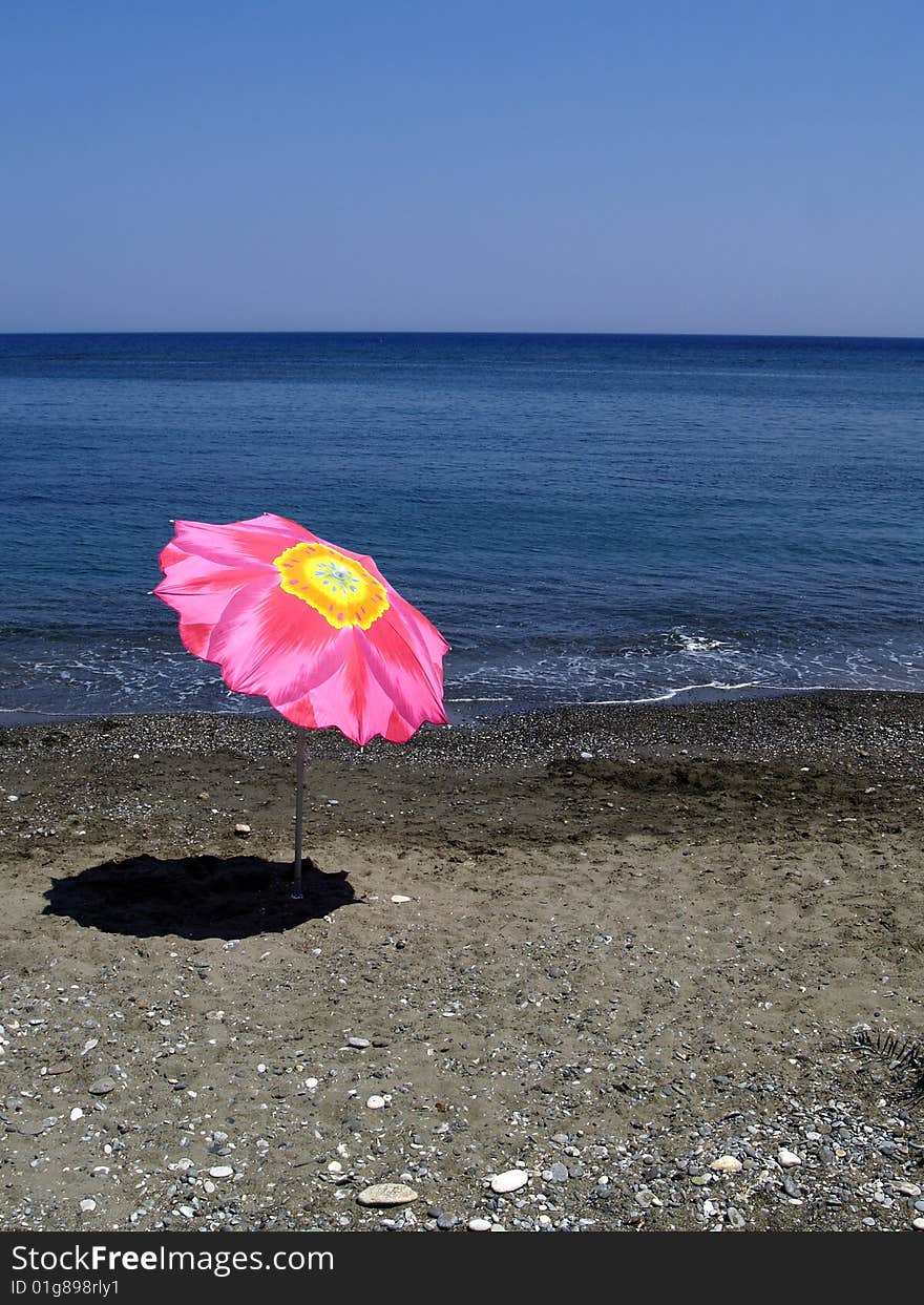 Exclusive umbrella on the beach, Crete, Greece