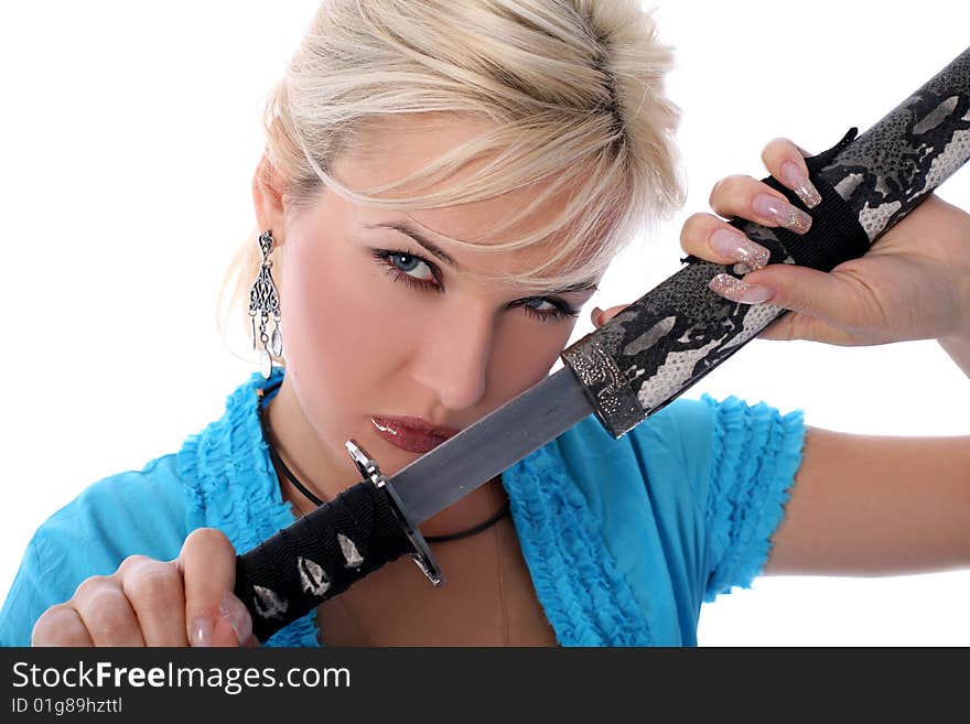 Girl holding in her hands a katana isolated on white. Girl holding in her hands a katana isolated on white