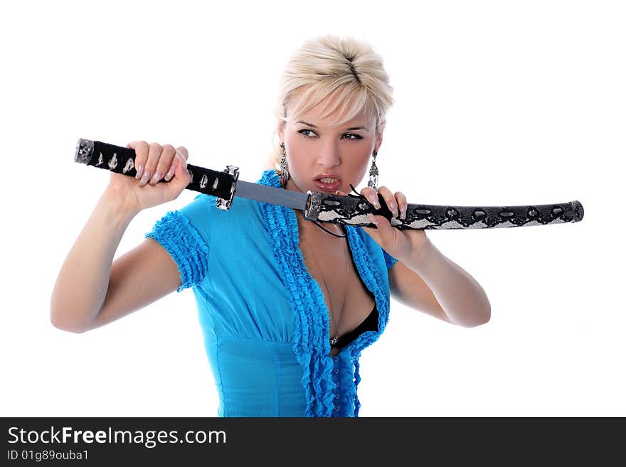 Blondie holding in her hands a katana isolated in white. Blondie holding in her hands a katana isolated in white