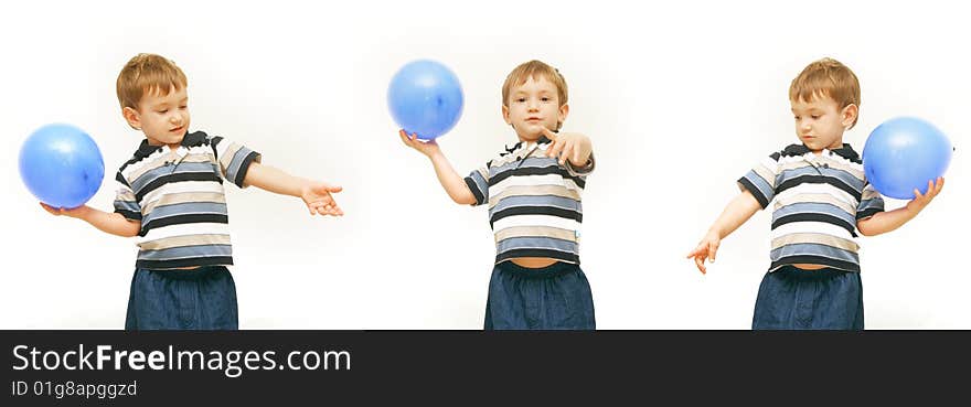 Boy with blue balloon over white