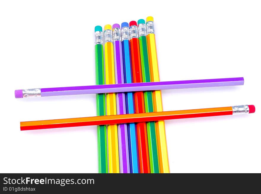 Colored pencils isolated on white.