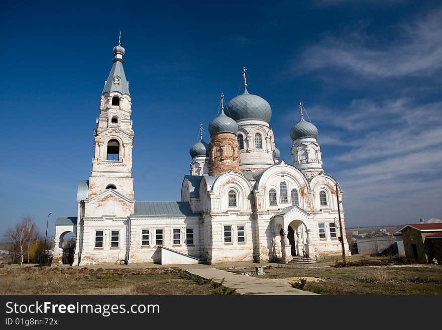 Old abandoned church and blue sky. Old abandoned church and blue sky