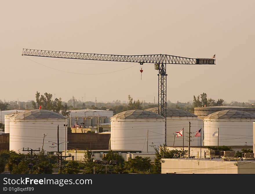 Crane Over Tanks on Grey Day