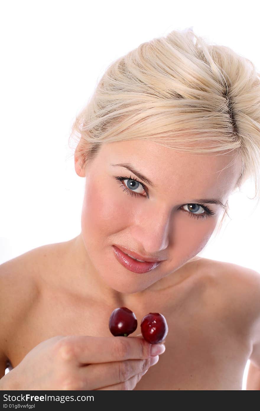 Lovely blondie with fresh cherry isolated on white. Lovely blondie with fresh cherry isolated on white