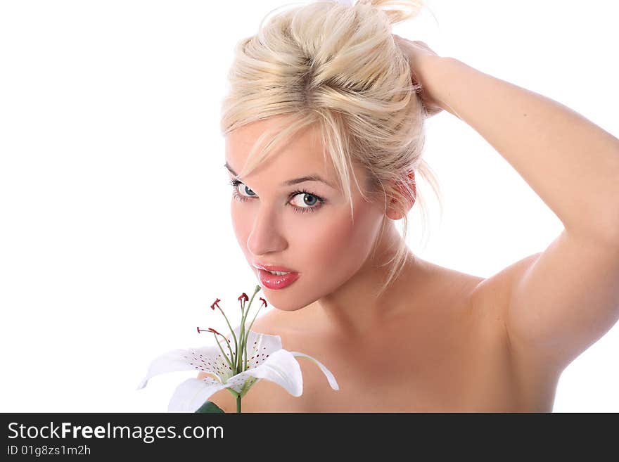 Lovely blondie girl with madonna lily isolated on white