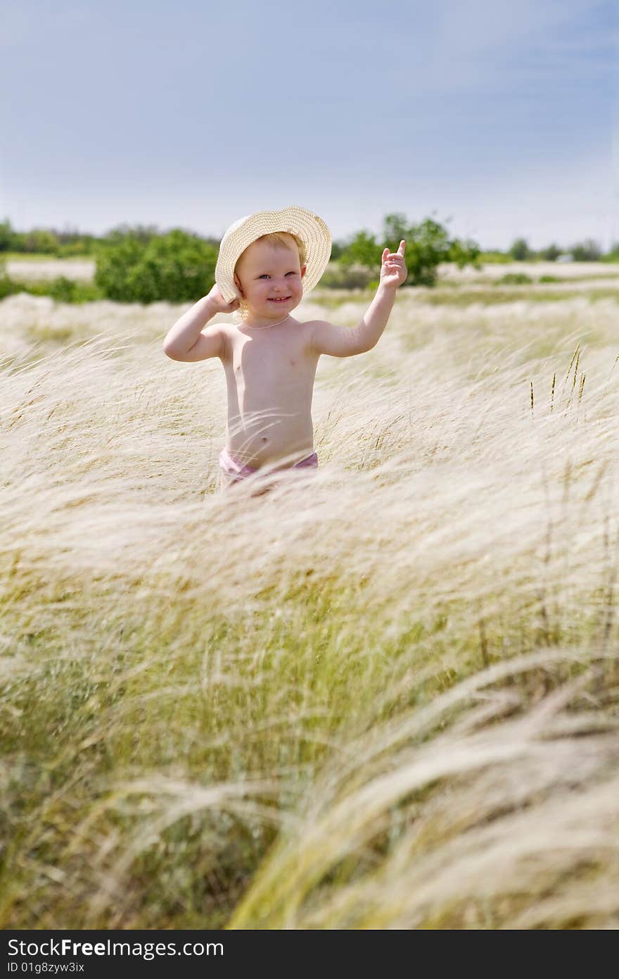 Girl in feather-grass