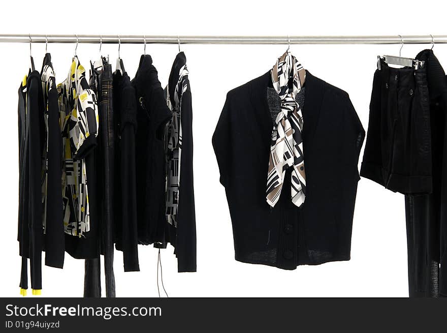 Designer fashion clothing hanging as display