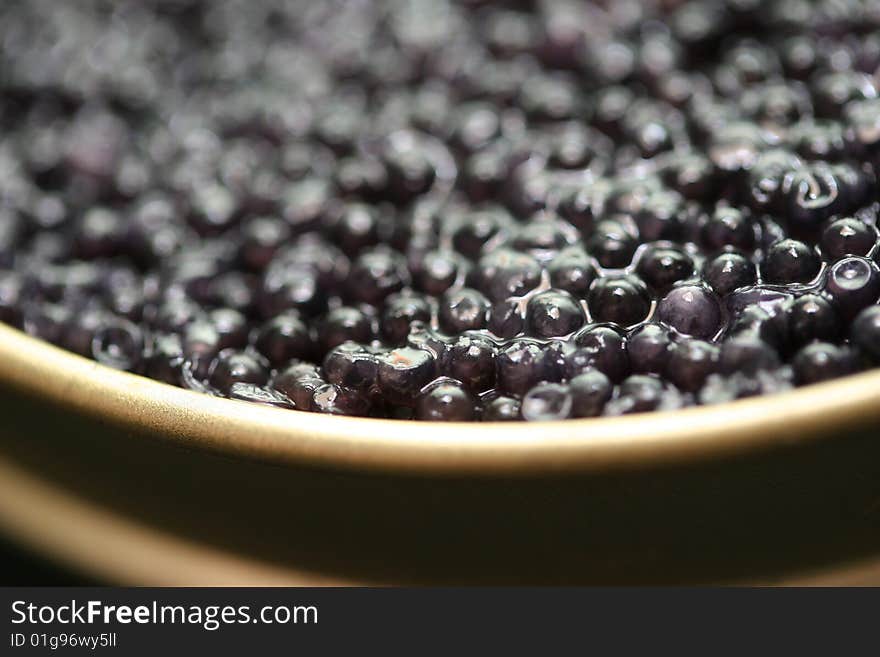 Black fresh Beluga Caviar in metal box tken as a Macro Image. Black fresh Beluga Caviar in metal box tken as a Macro Image