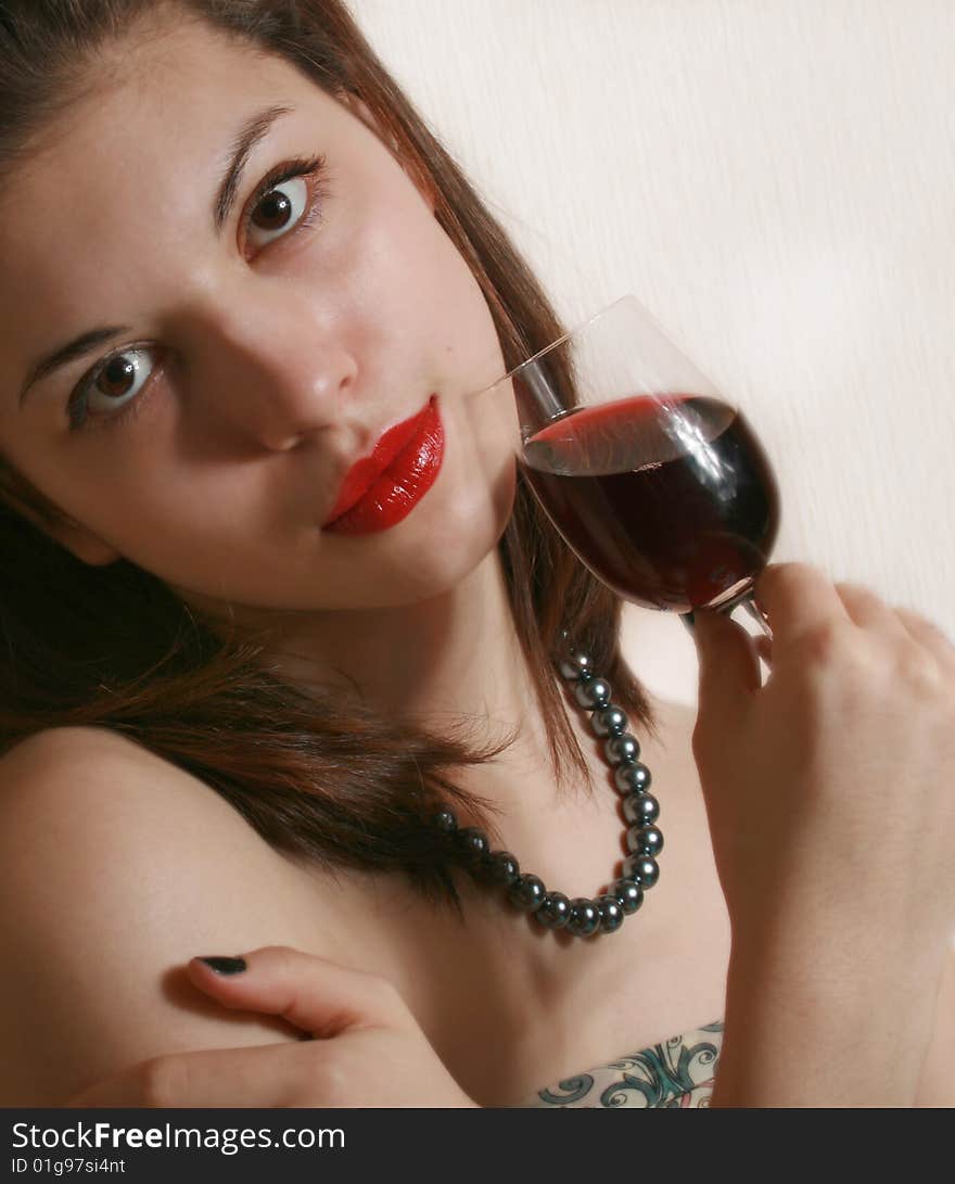 Portrait of the girl with a glass of wine. Portrait of the girl with a glass of wine.