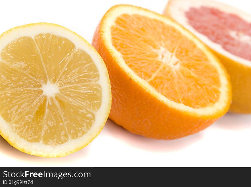 Slices of an lemon, orange and grapefruit closeup