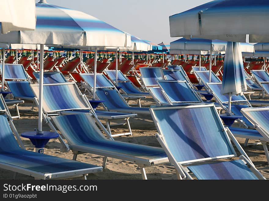 Landscape with beach umbrellas and sunbeds