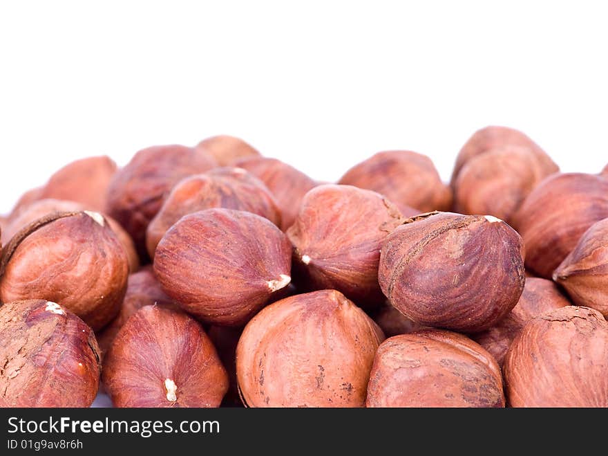 Some hazelnuts isolated on the white background