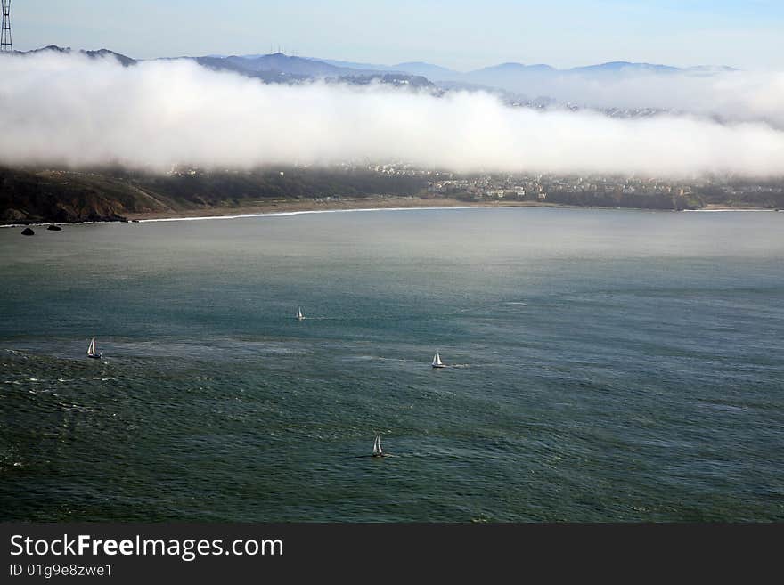 Fog is rolling in San Francisco bay.