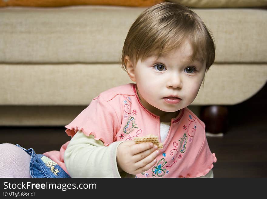 Sweet  toddler baby girl eating. Sweet  toddler baby girl eating