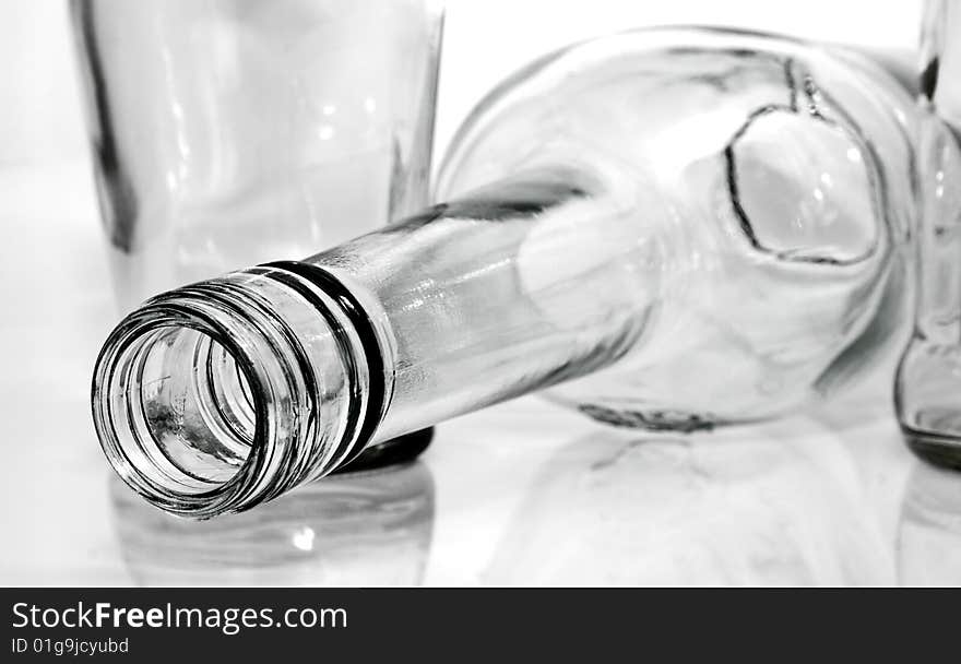 The empty tipped bottle over on a white background