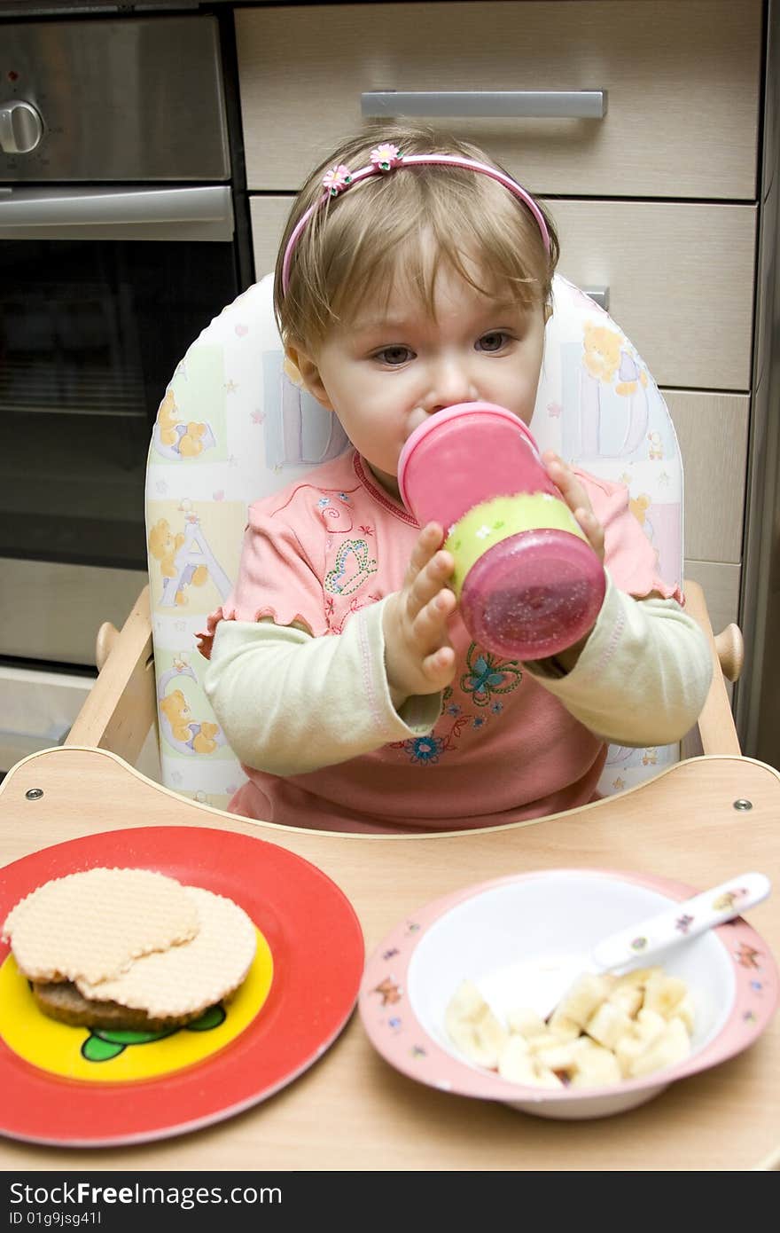 Sweet toddler baby girl eating. Sweet toddler baby girl eating