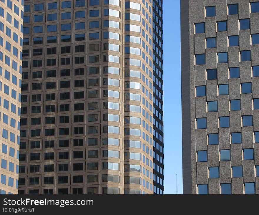 In Montreal, Quebec, Canada, two buildings close to each other. Very few space to breath and to see the sky. In Montreal, Quebec, Canada, two buildings close to each other. Very few space to breath and to see the sky.