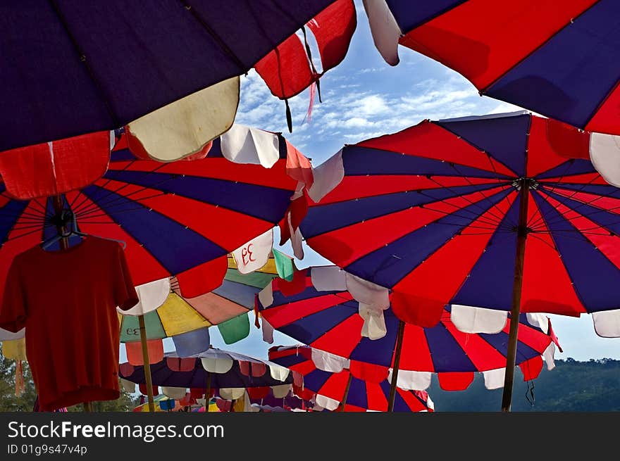 Colorful umbrella on a beach in Thailand