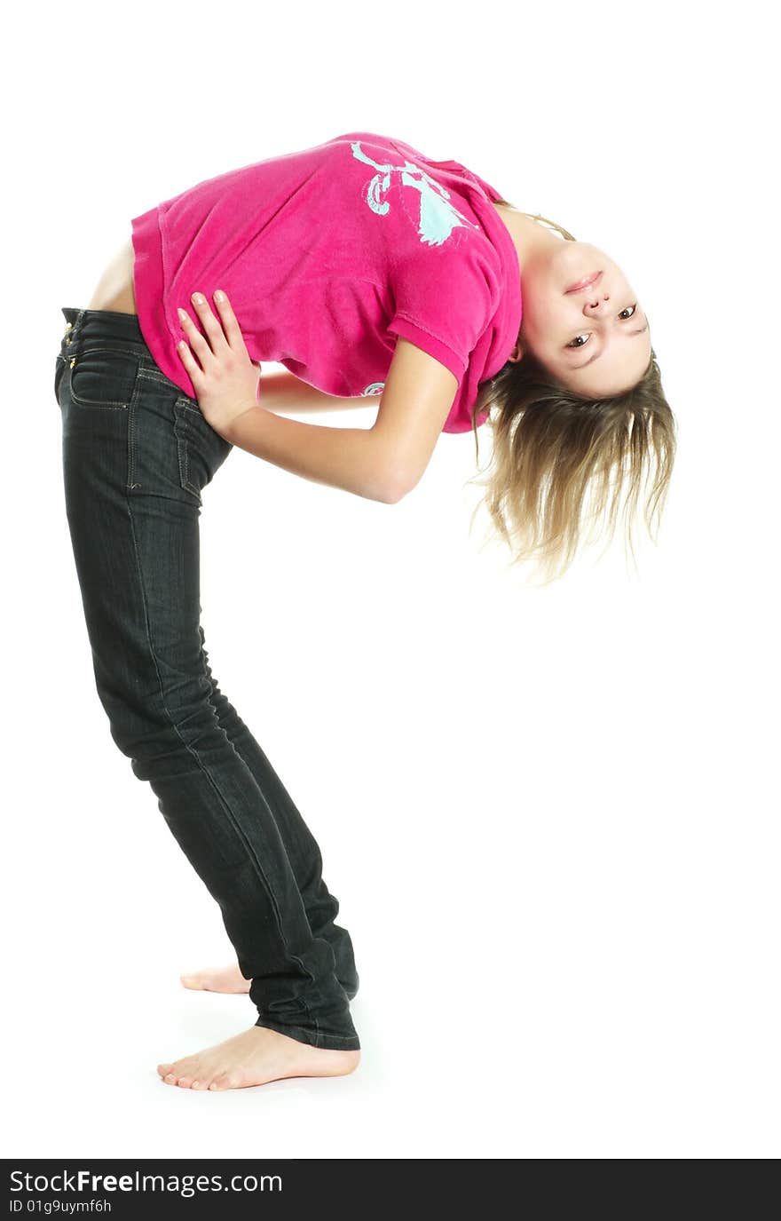 Smiling stratching tennage girl on white background