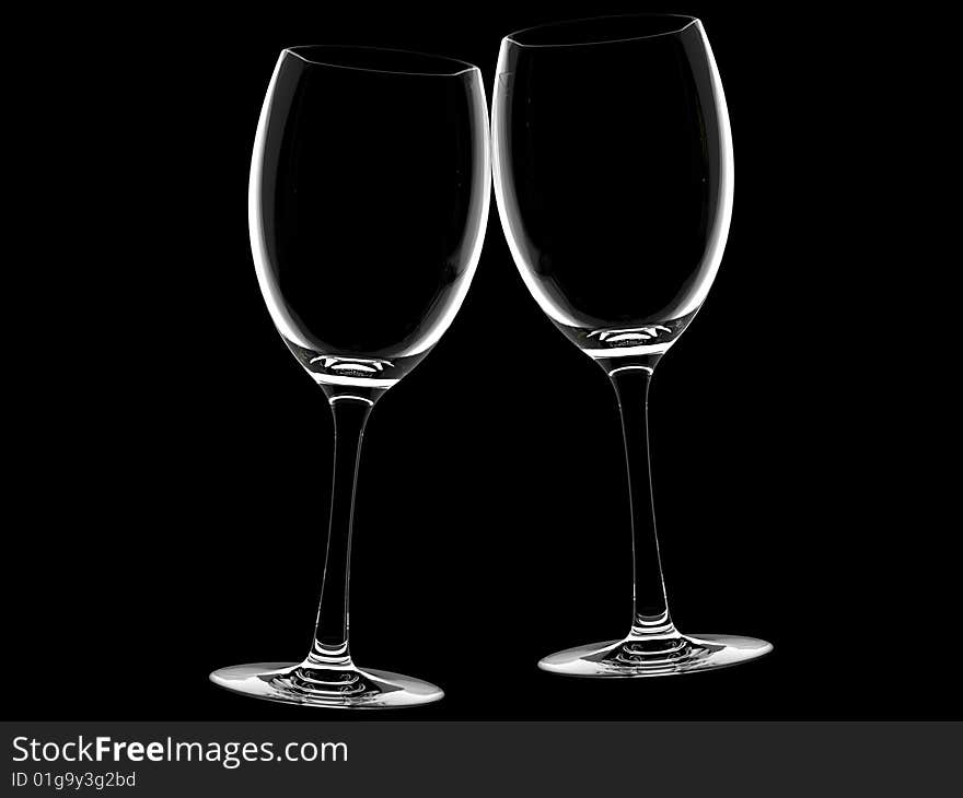 Champagne glass on black background