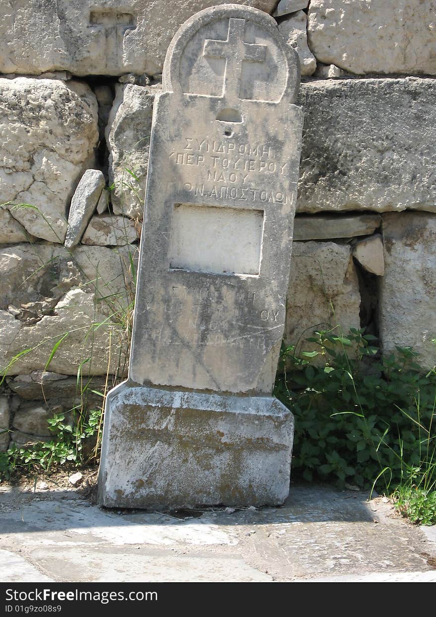 A tombstone made of marble at the Agora in Athens, Greece. A tombstone made of marble at the Agora in Athens, Greece.