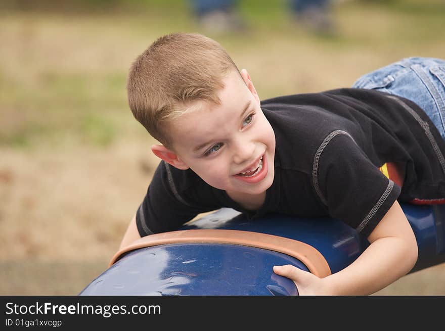 Adorable Child Playing at the Playground