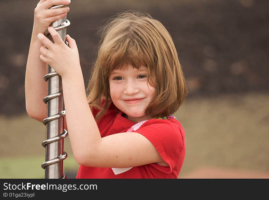 Adorable Young Girl Having Fun at the Park. Adorable Young Girl Having Fun at the Park.