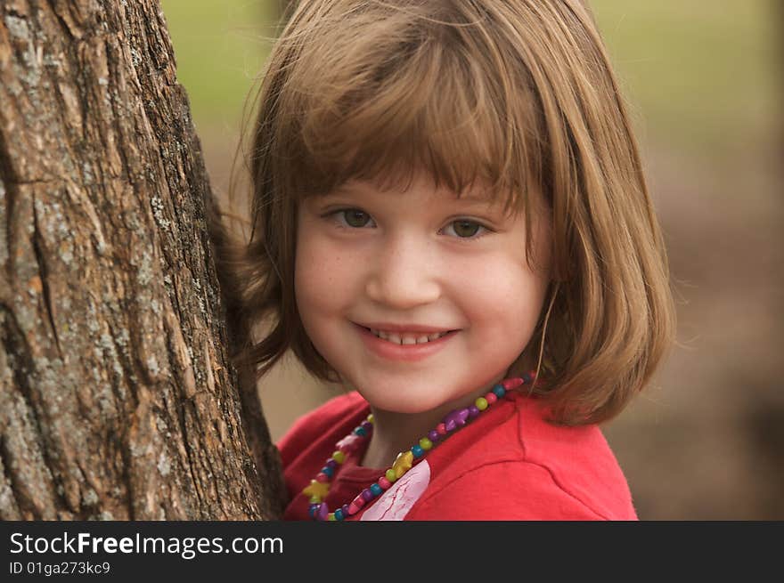 Adorable Young Girl Having Fun at the Park. Adorable Young Girl Having Fun at the Park.