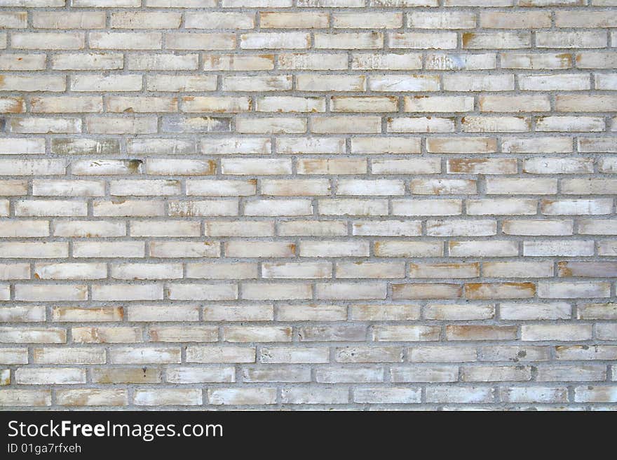 Yellow brick wall of new building