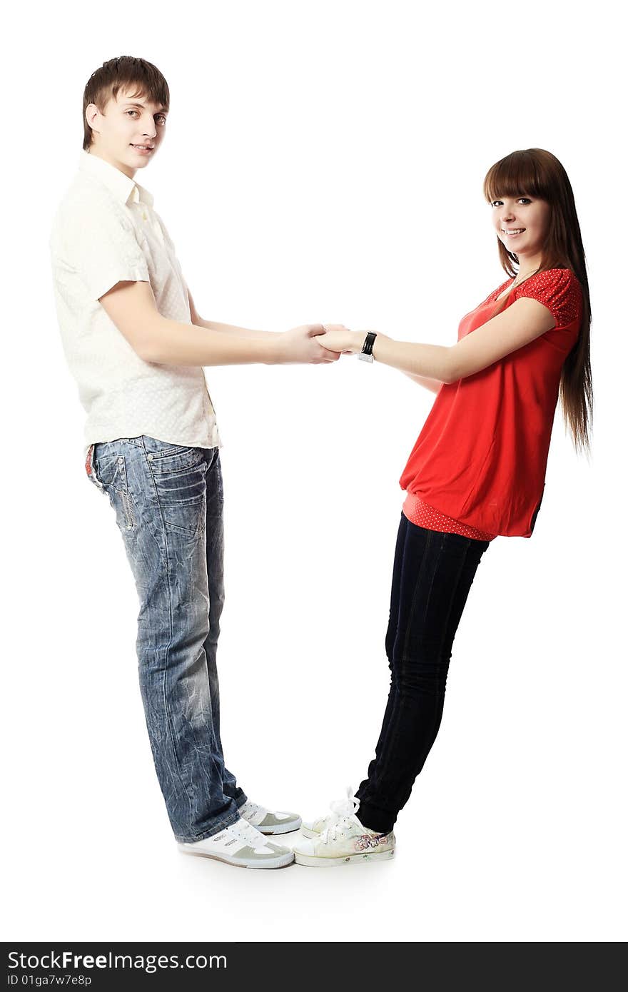 Portrait of young people in love. Shot in a studio. Portrait of young people in love. Shot in a studio.