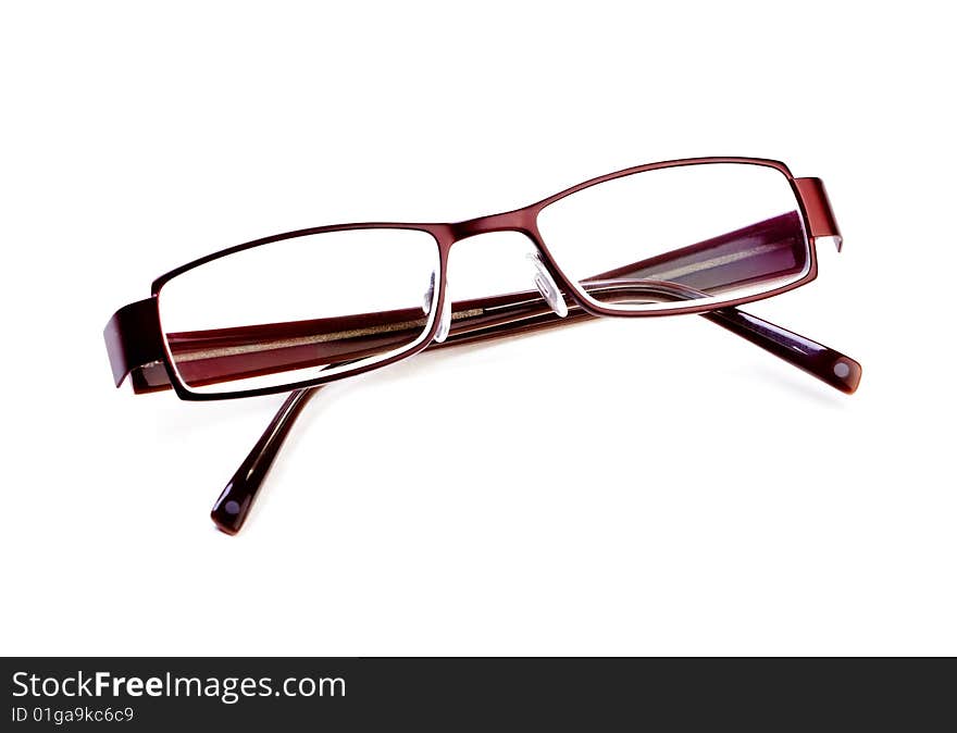 Brown modern glasses isolated over a white background