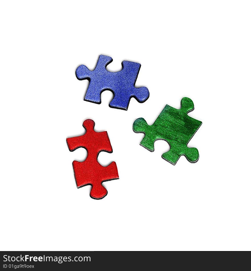 Three colored elements of puzzle isolated over a white background