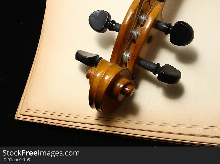 Fiddle on old brown paper