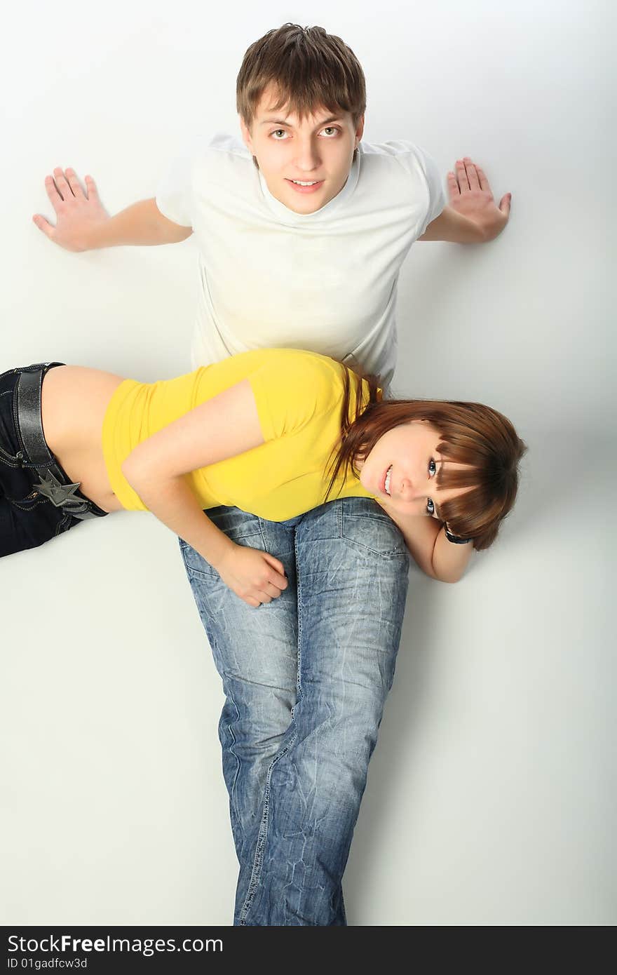 Portrait of young people in love. Shot in a studio. Portrait of young people in love. Shot in a studio.