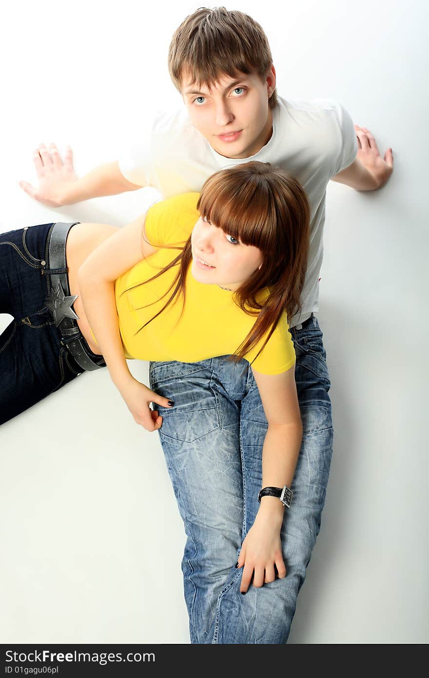 Portrait of young people in love. Shot in a studio. Portrait of young people in love. Shot in a studio.