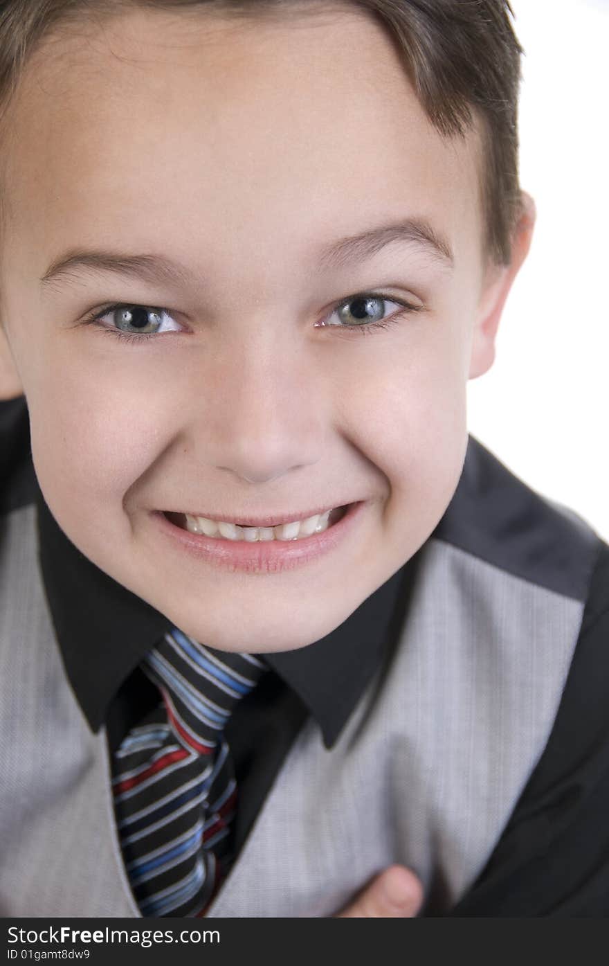 Image of small boy with toothless smile, grinning for camera. Image of small boy with toothless smile, grinning for camera