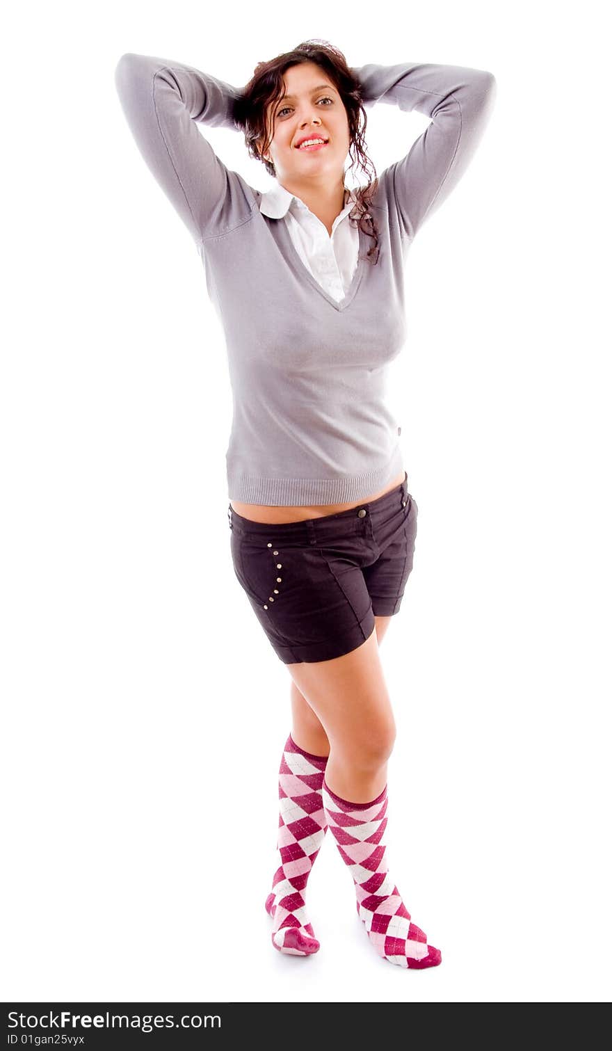 Standing female putting hands on head