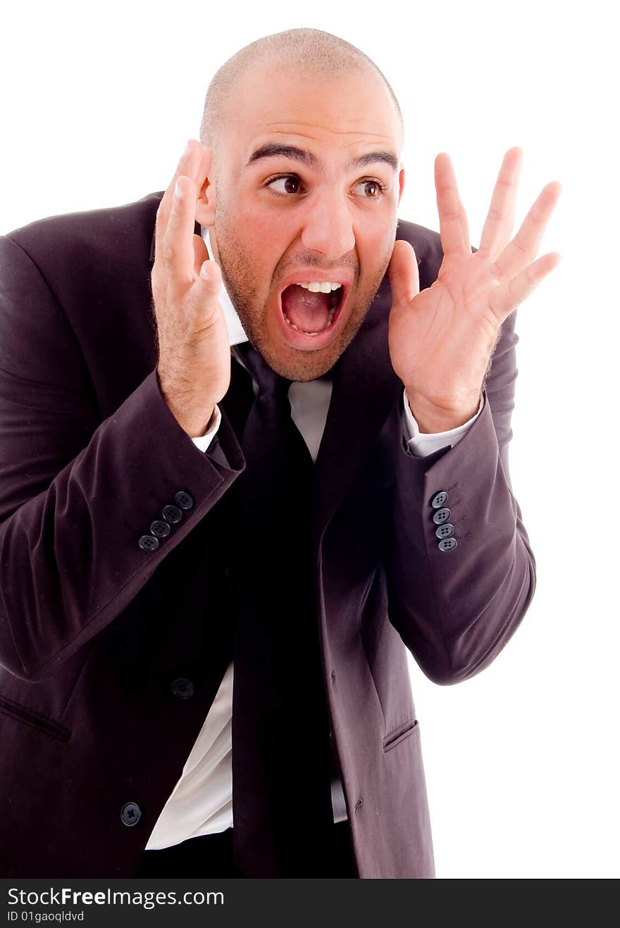 Businessman shouting loudly with white background