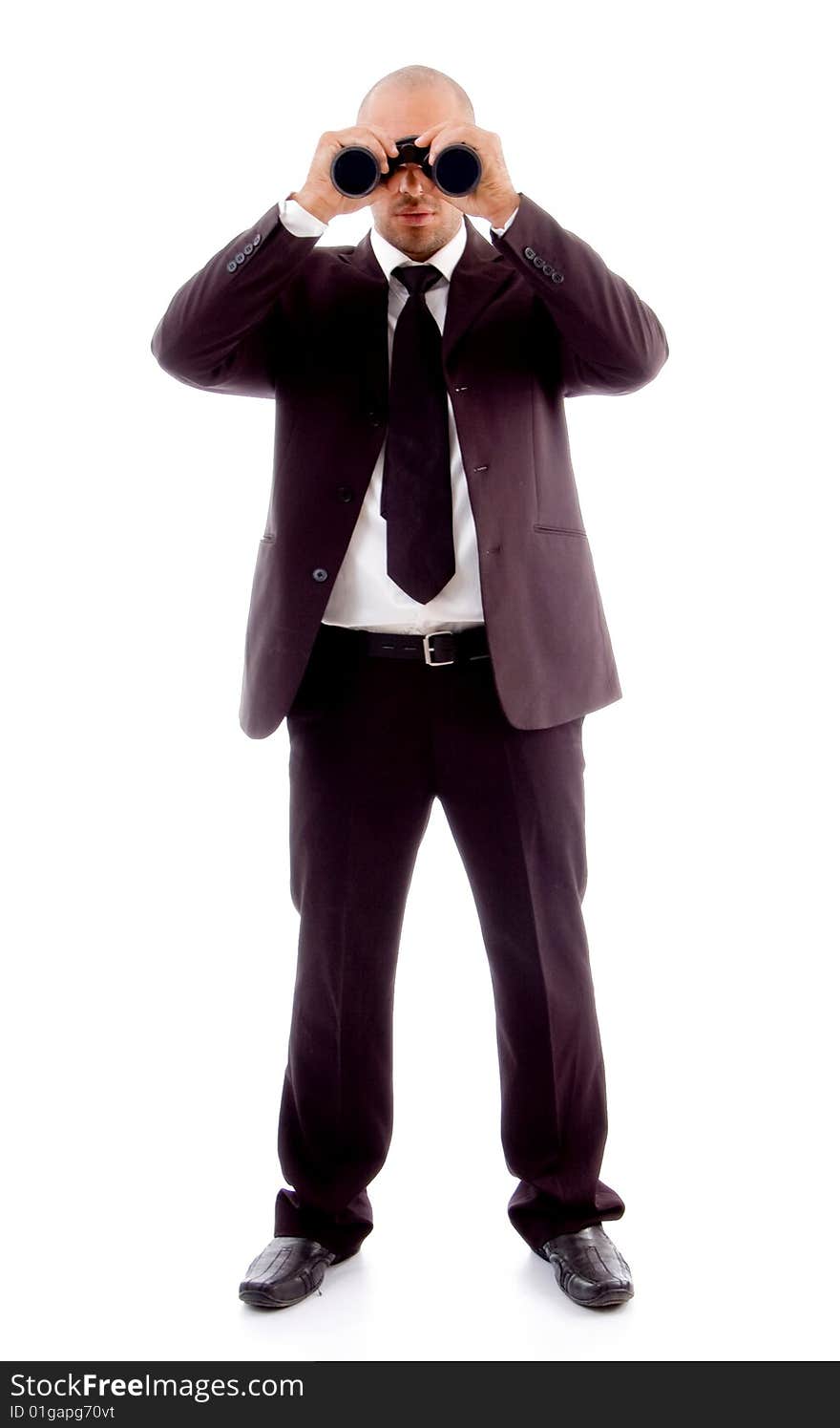 Standing male looking through binocular on an isolated white background