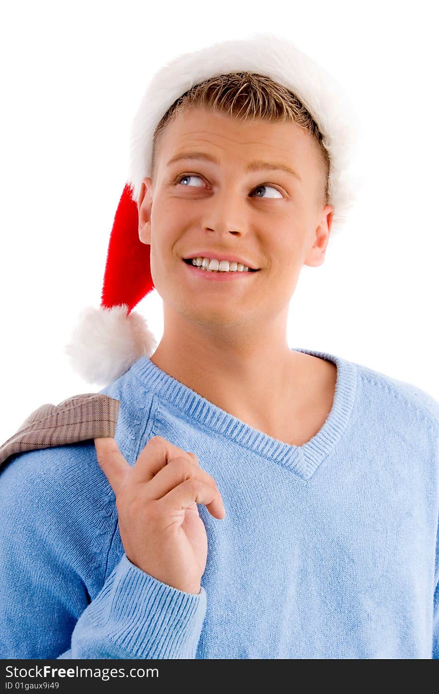 Christmas - smiling young man with christmas hat