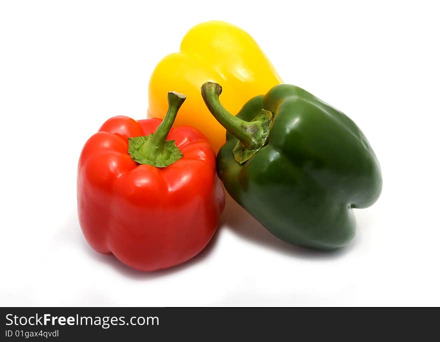 Three different color peppers