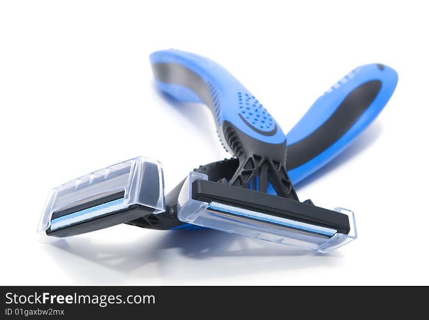 Two blue and black shavers