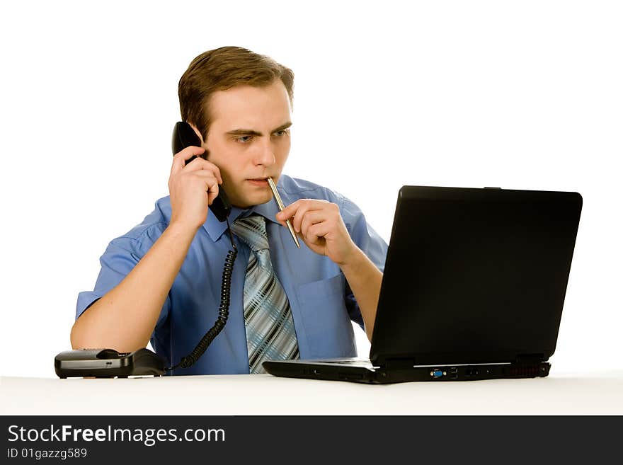 Businessman working on laptop. Isolated on white.