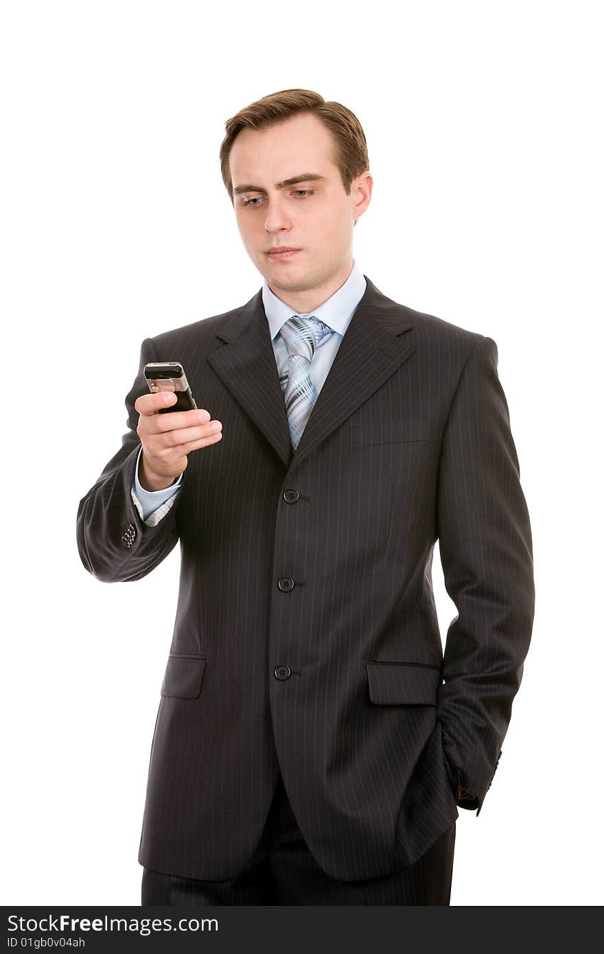 Businessman with mobile phone. Isolated on white.