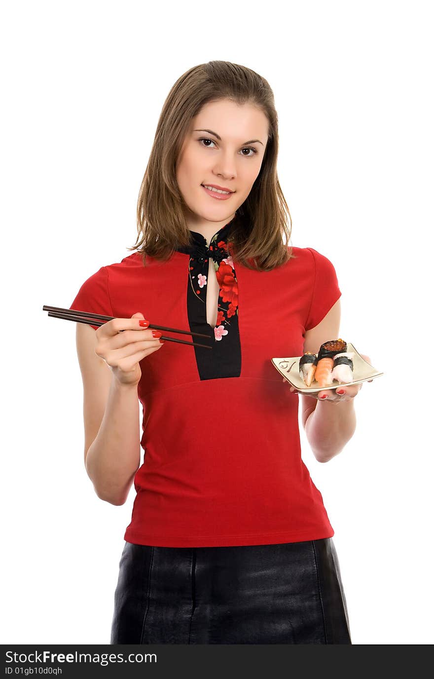 Smiling girl with chopsticks and sushi. Isolated on white