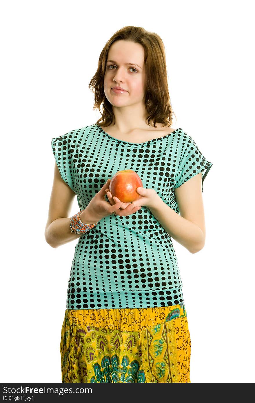 Beautiful young girl with an apple. Isolated on white.